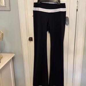 Adrienne Vittadini blue wide leg stretch pants with white band.